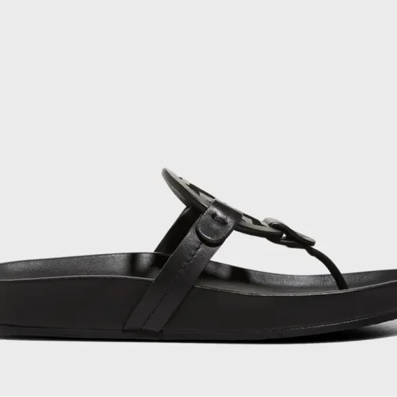 Tory Burch cloud thong sandals.