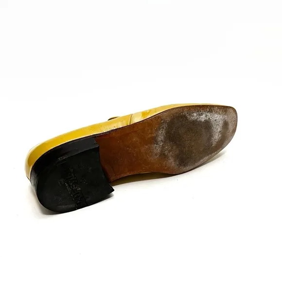 Vintage 1970s men’s beige yellow patent leather horsebit loafers