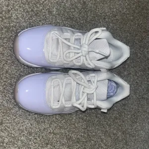 Women’s White and Purple Sneakers