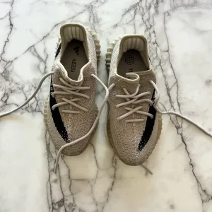 Yeezy Cream and White Sneakers